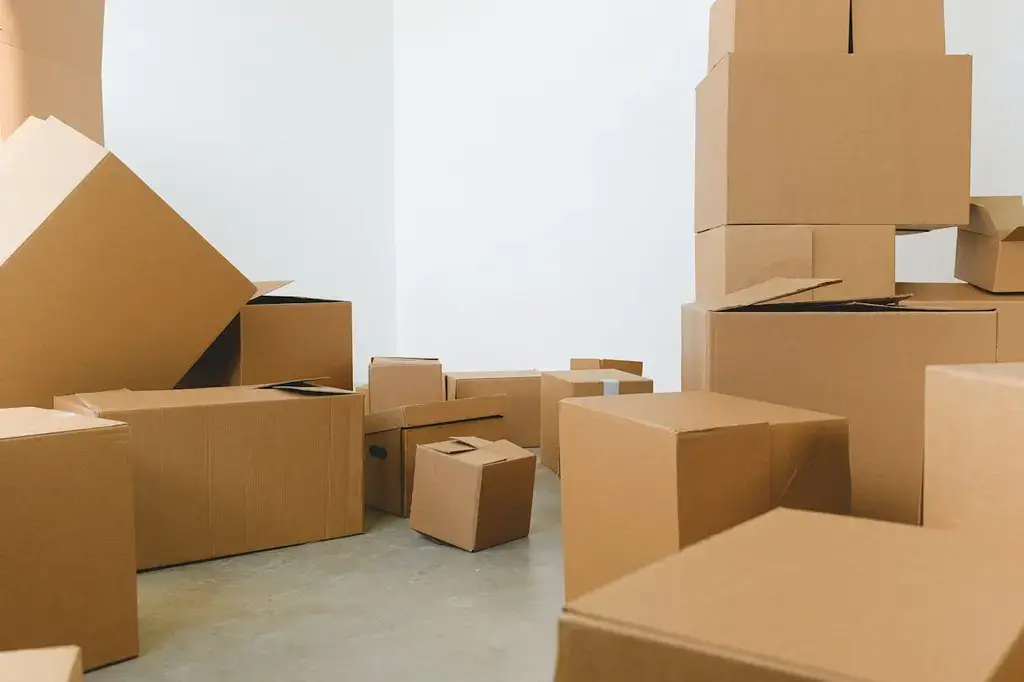 Boxes stacked around a room